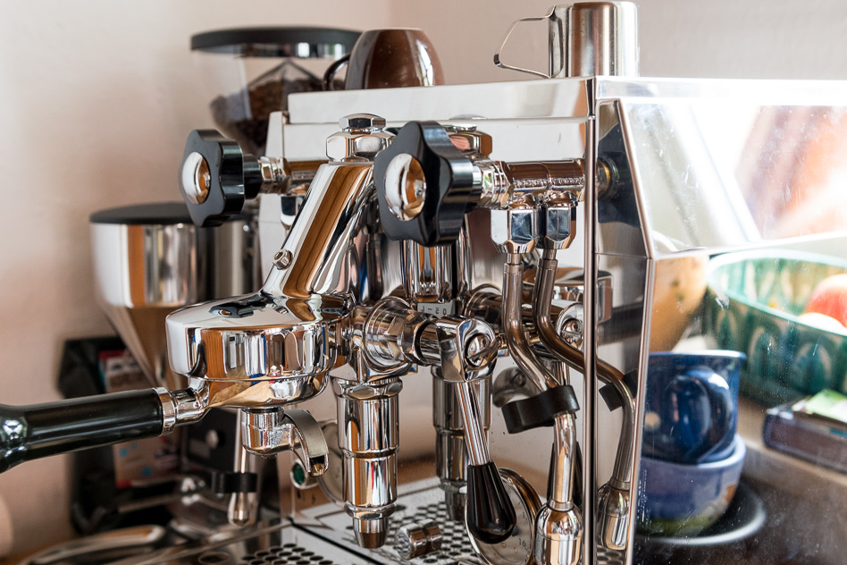 Closer photo of the espresso machine in my kitchen with the grinder in the background